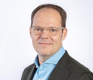 Das Pressefoto zeigt Mag. Christian Wildfeuer, CInsO Europäische Reiseversicherung